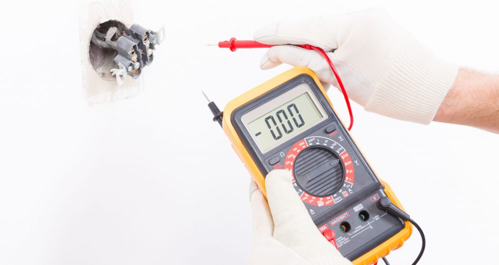 38335680 - electrician checking socket voltage with digital multimeter